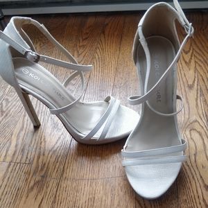 Strappy white stilettos